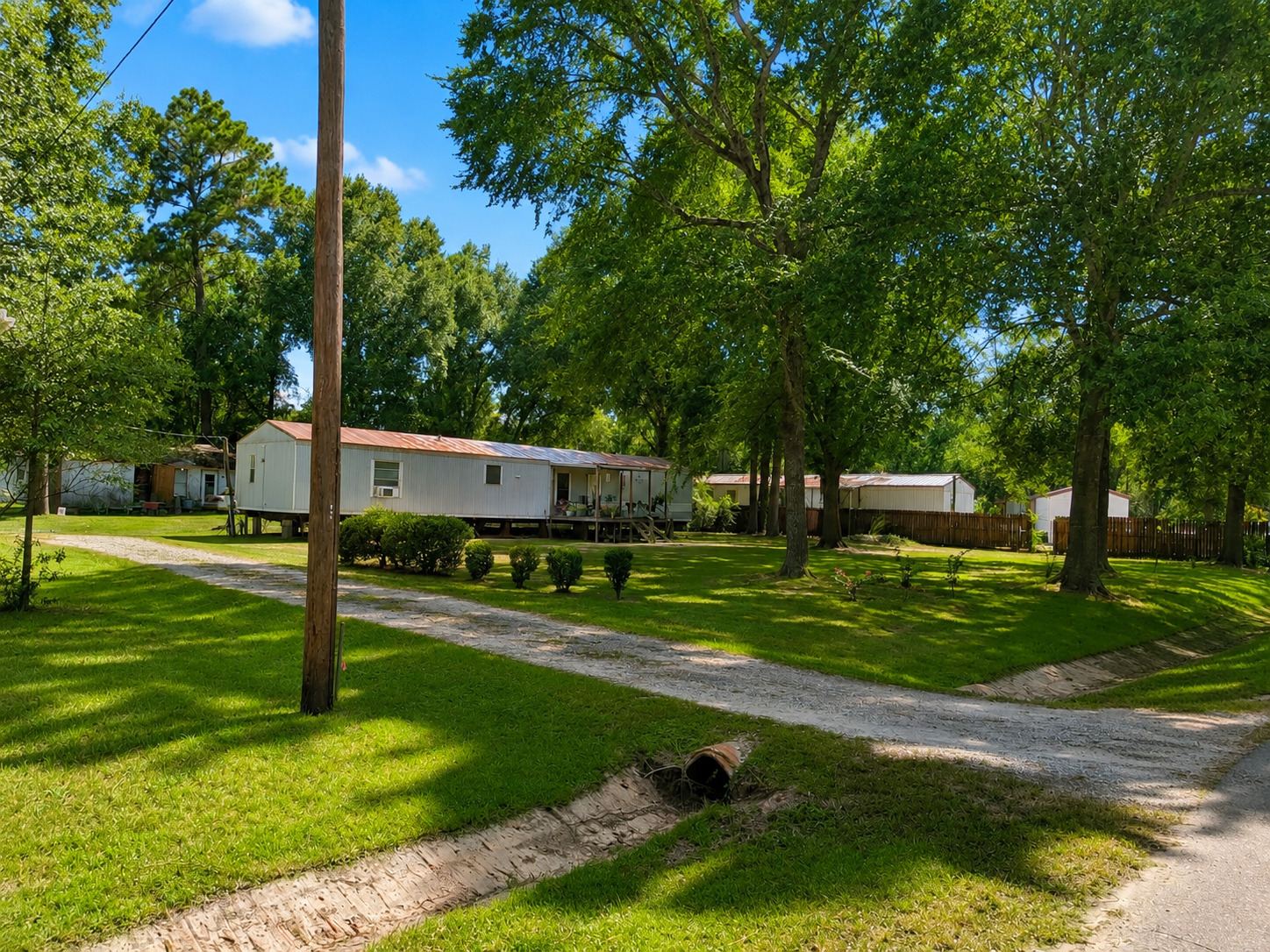 Driveway and structures across the property